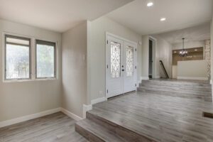 A room with stairs and a window in it